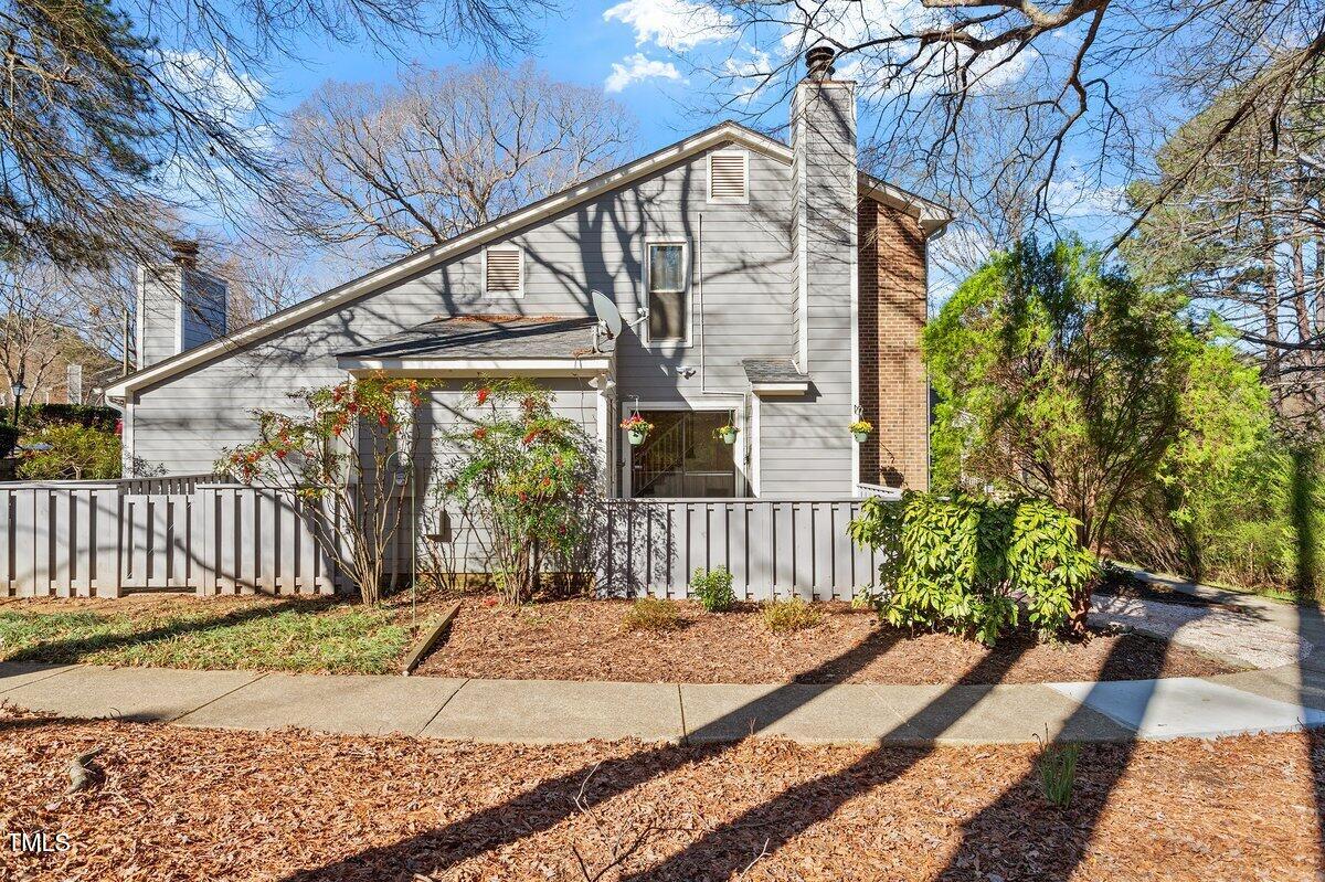 205 Clancy Circle Cary, NC 27511 - Photo 5 of 36 a view of a house with a small yard
