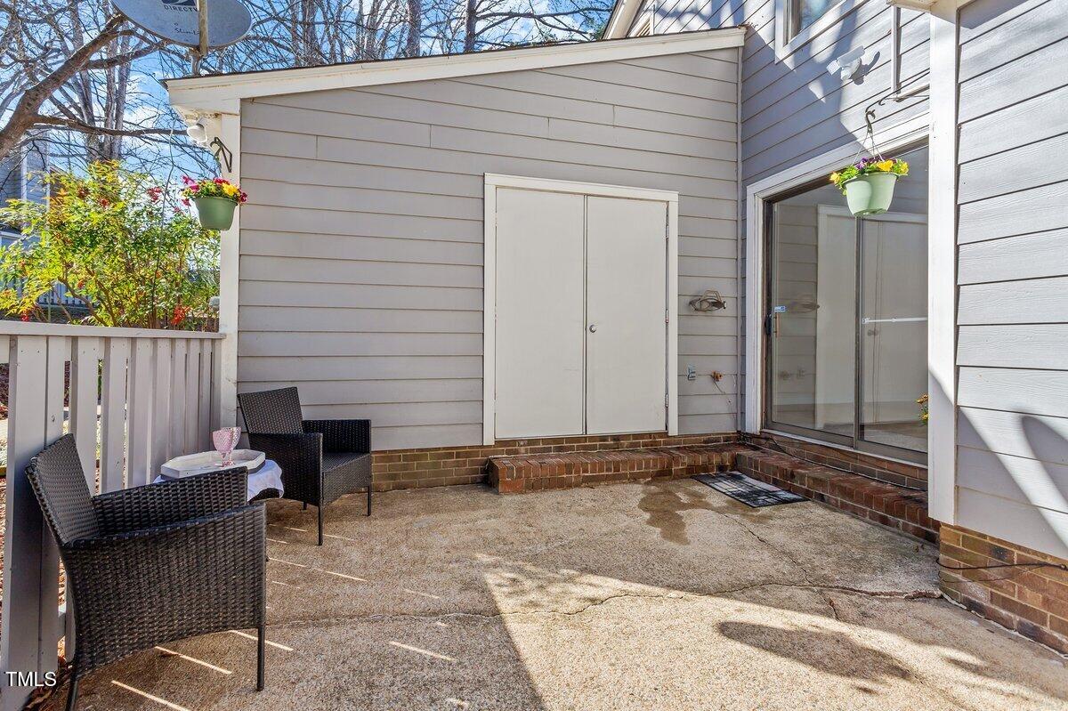 205 Clancy Circle Cary, NC 27511 - Photo 6 of 36 a view of backyard with a chair and table in the patio