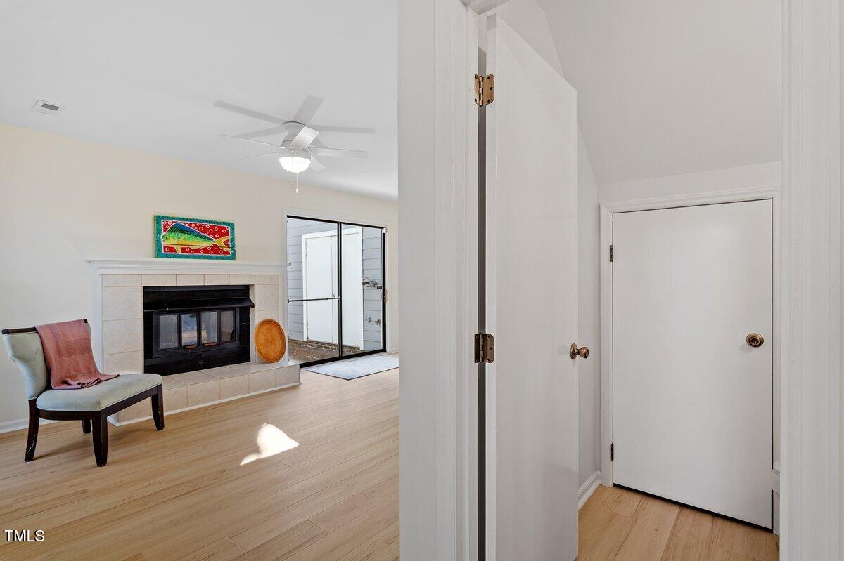 205 Clancy Circle Cary, NC 27511 - Photo 7 of 36 a view of a livingroom with furniture and wooden floor