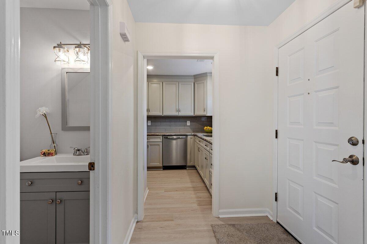 205 Clancy Circle Cary, NC 27511 - Photo 8 of 36 a bathroom with a sink toilet and tub