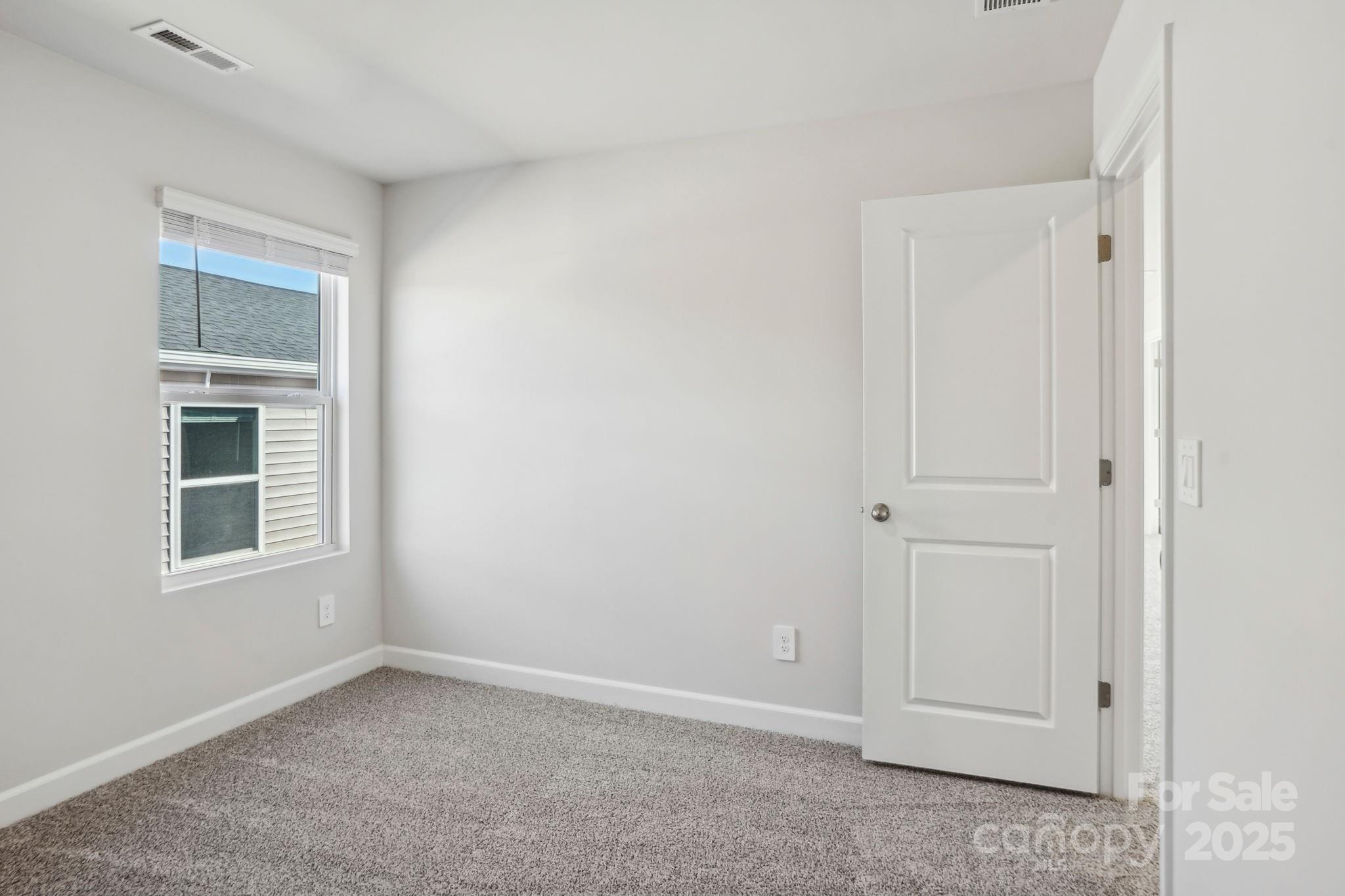 1265 30th St Lane Northeast Conover, NC 28613 - Photo 15 of 24 a view of an empty room with a window