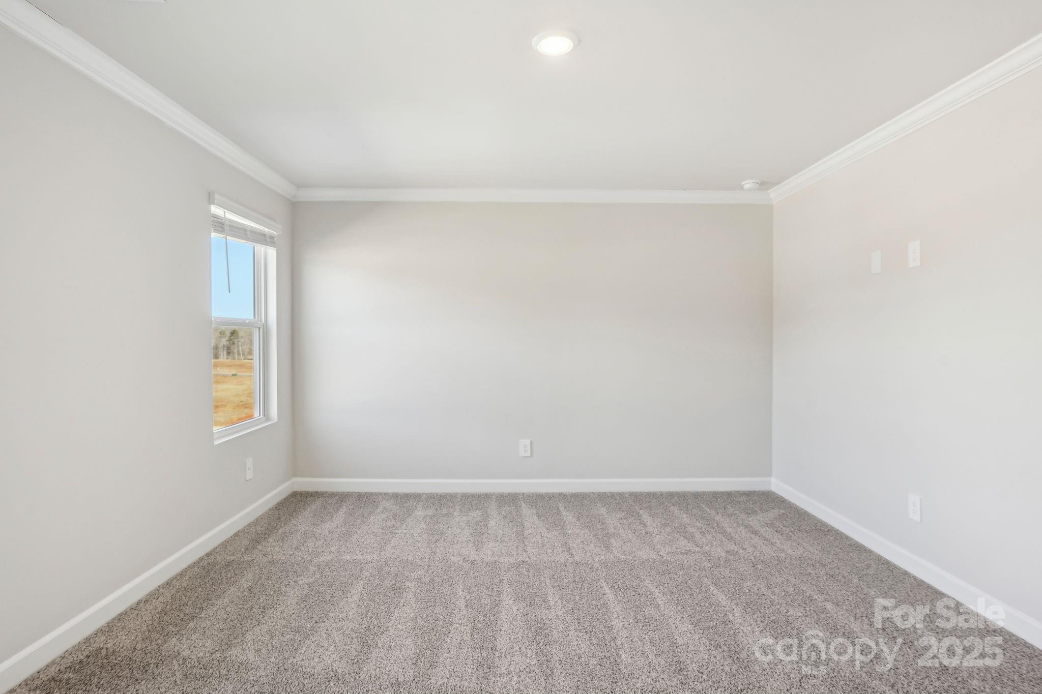 1265 30th St Lane Northeast Conover, NC 28613 - Photo 21 of 24 an empty room with a window