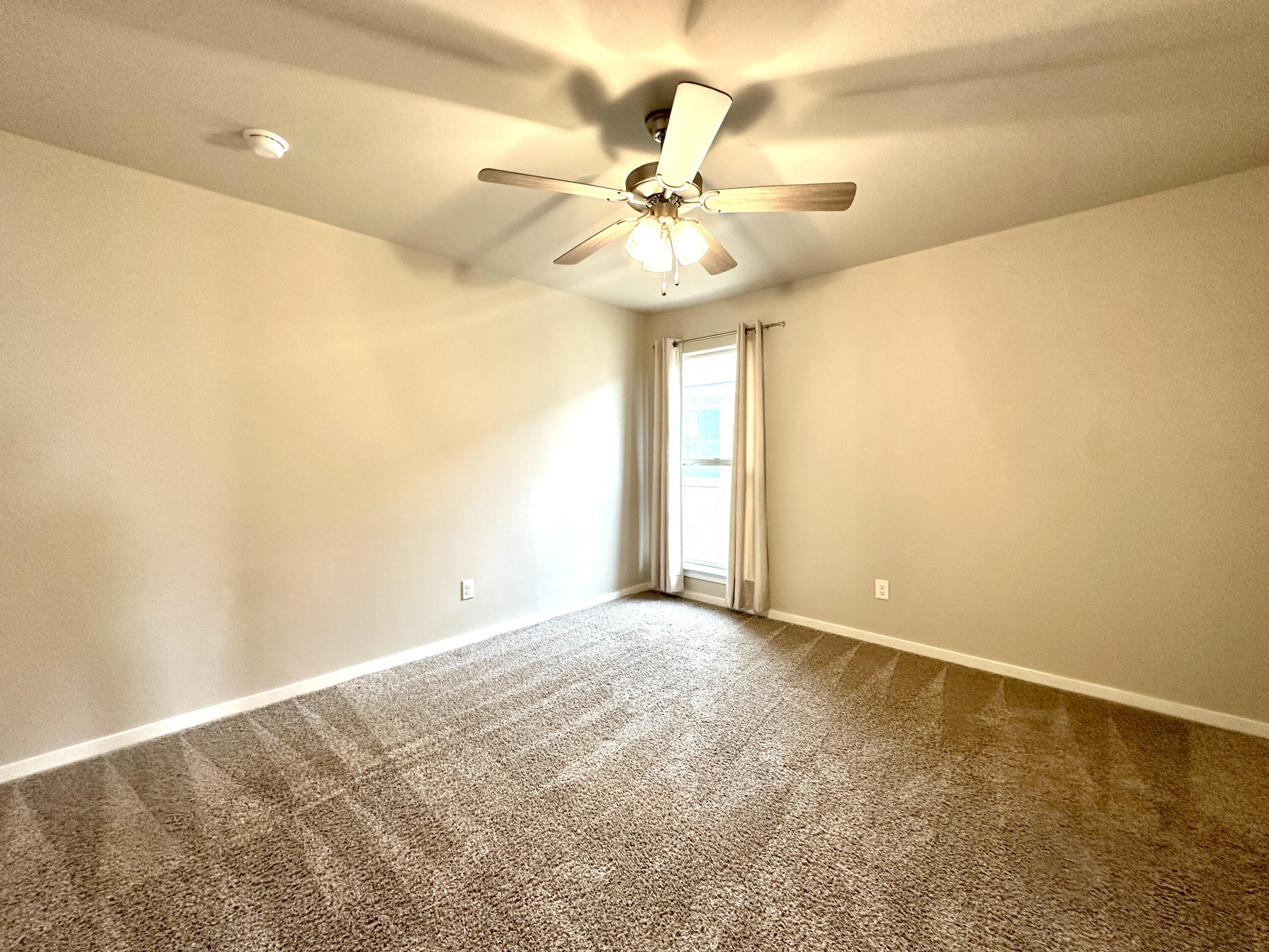 7526 31st Place Lubbock, TX 79407 - Photo 9 of 14 a view of an empty room