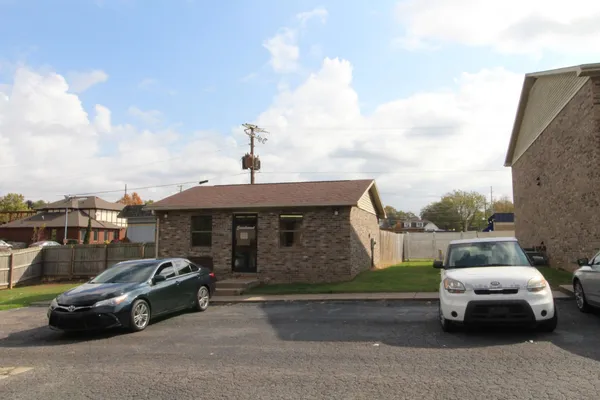 a car parked in front of a house
