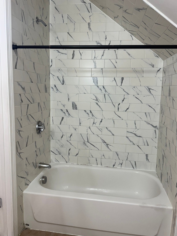 61 Crescent Avenue, Unit 2 Chelsea, MA 02150 - Photo 11 of 16 a bathroom with a bathtub
