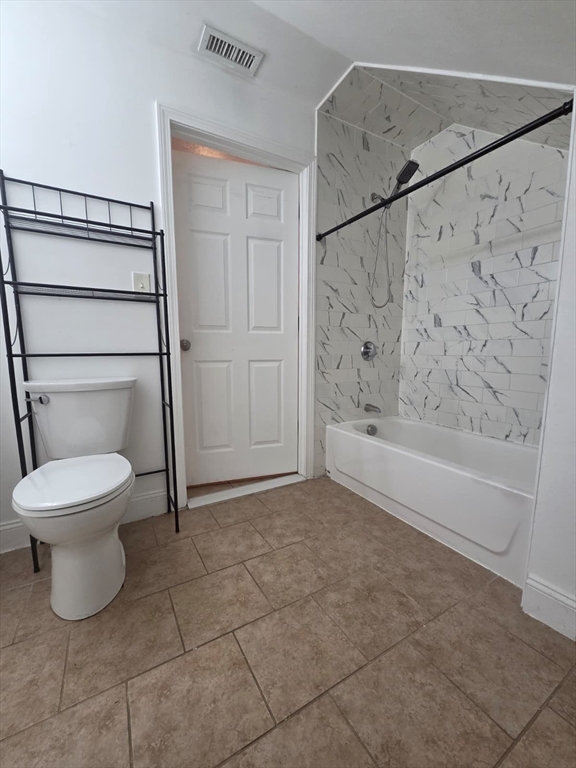 61 Crescent Avenue, Unit 2 Chelsea, MA 02150 - Photo 12 of 16 a bathroom with a toilet and a shower