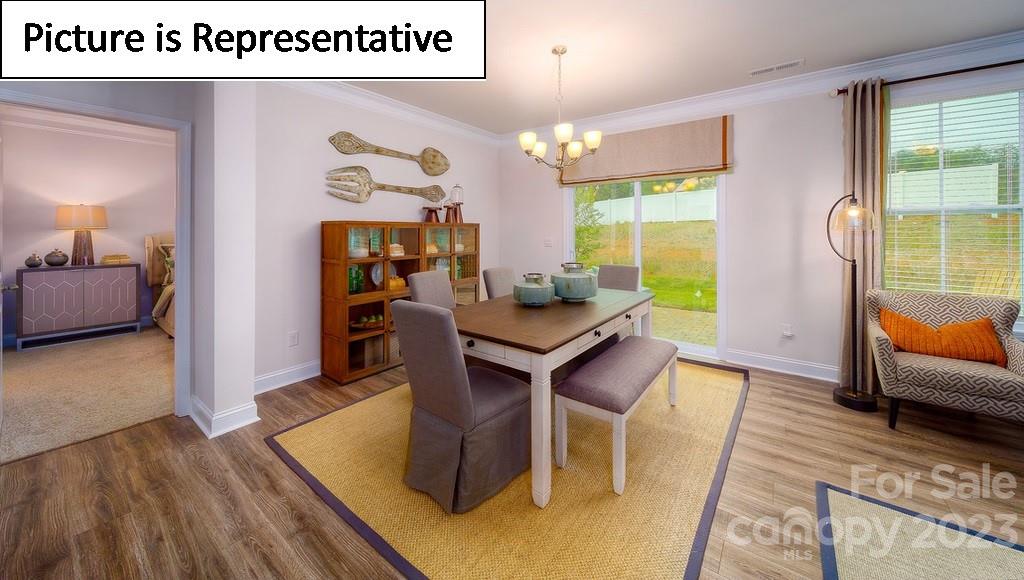 4182 Millstream Road Denver, NC 28037 - Photo 21 of 29 a living room with furniture and a table