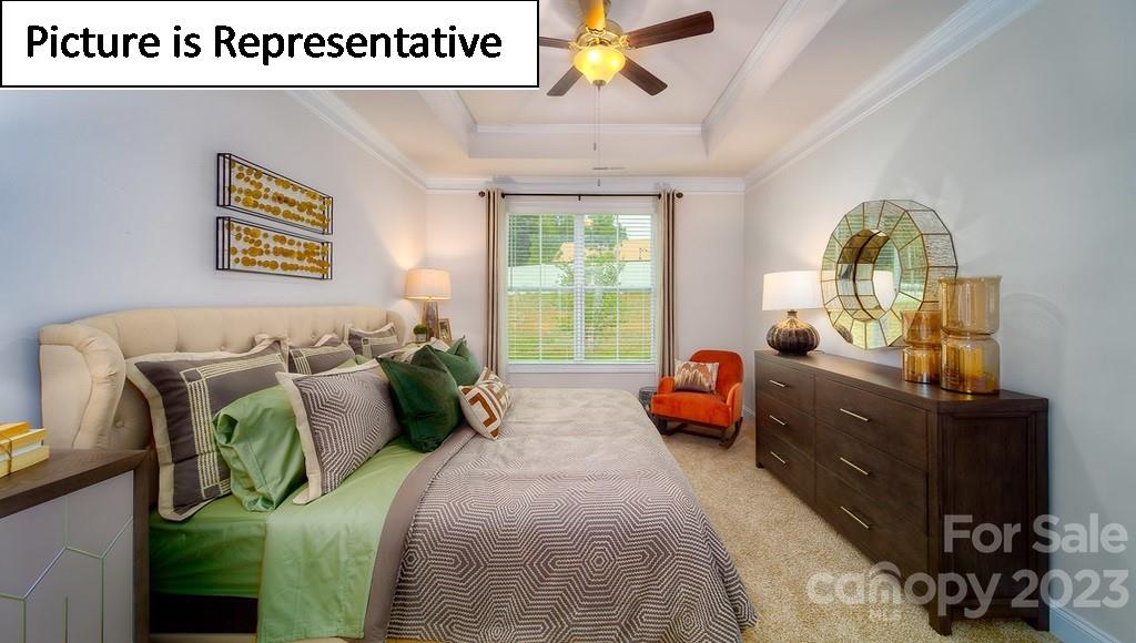 4182 Millstream Road Denver, NC 28037 - Photo 26 of 29 a bedroom with bed and window