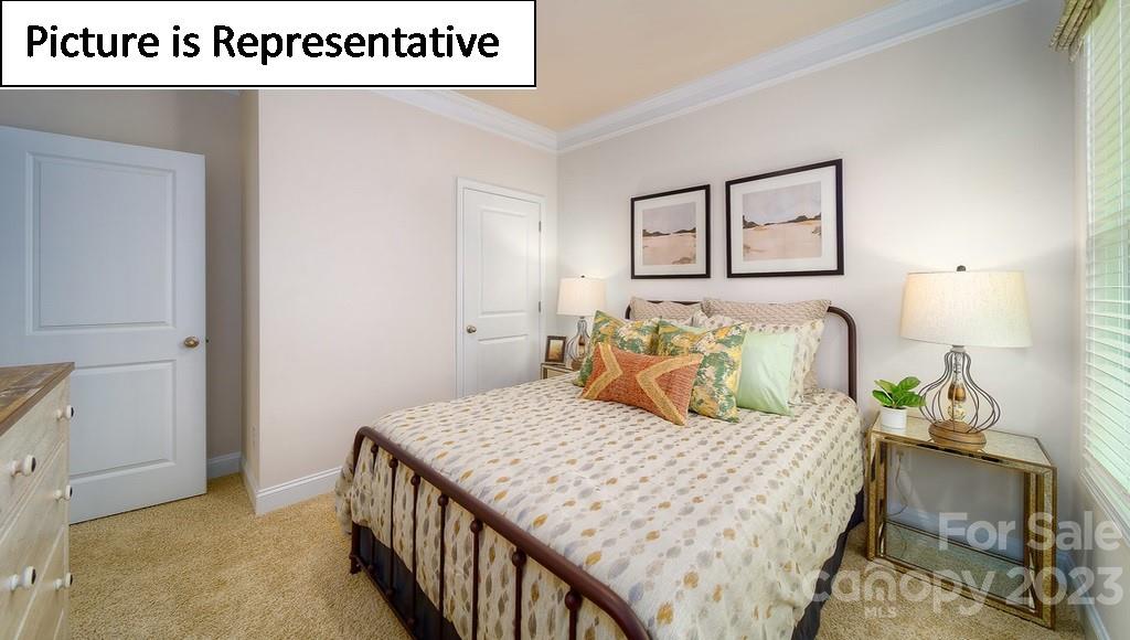 4182 Millstream Road Denver, NC 28037 - Photo 7 of 29 a bedroom with a bed and with furniture
