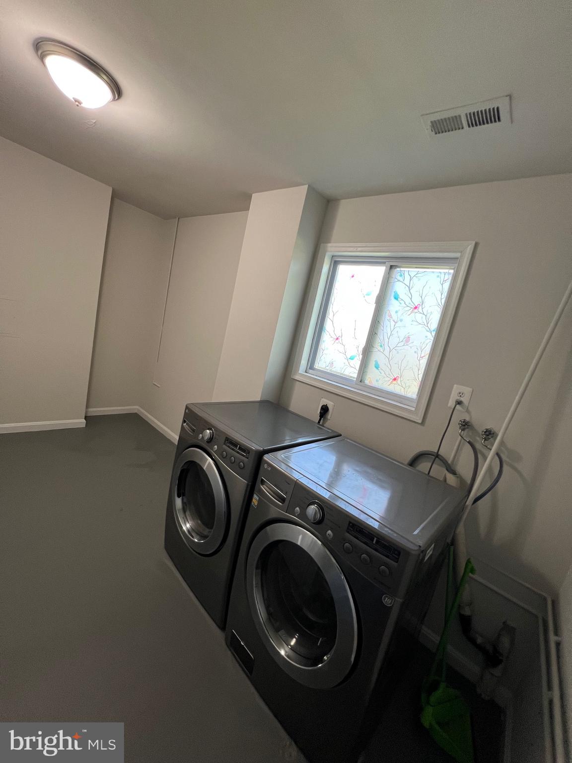 6604 Suitland Road Suitland, MD 20746 - Photo 25 of 27 a utility room with dryer and washer