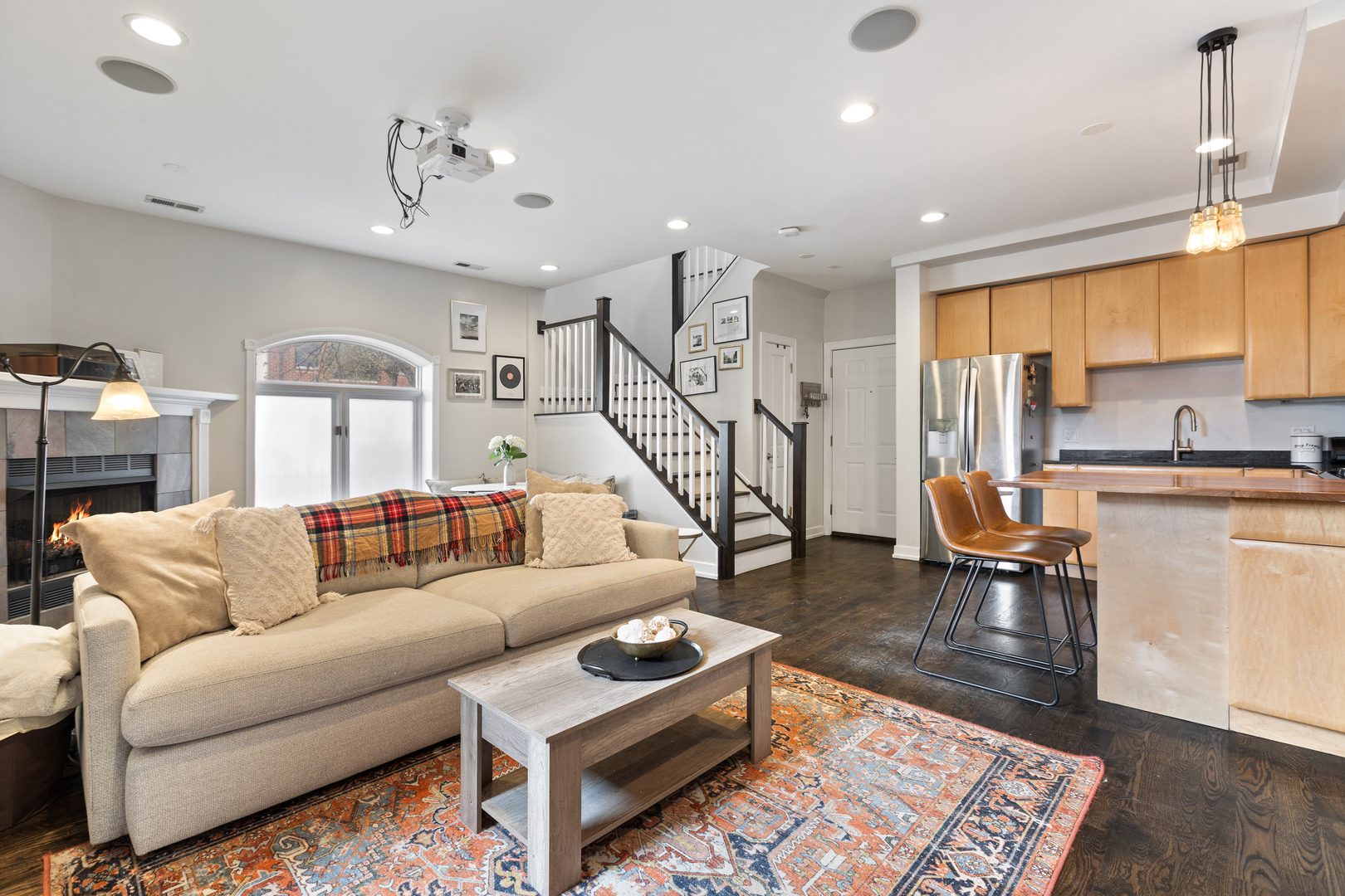 417 North Noble Street, Unit 5 Chicago, IL 60642 - Photo 2 of 15 a living room with furniture and wooden floor