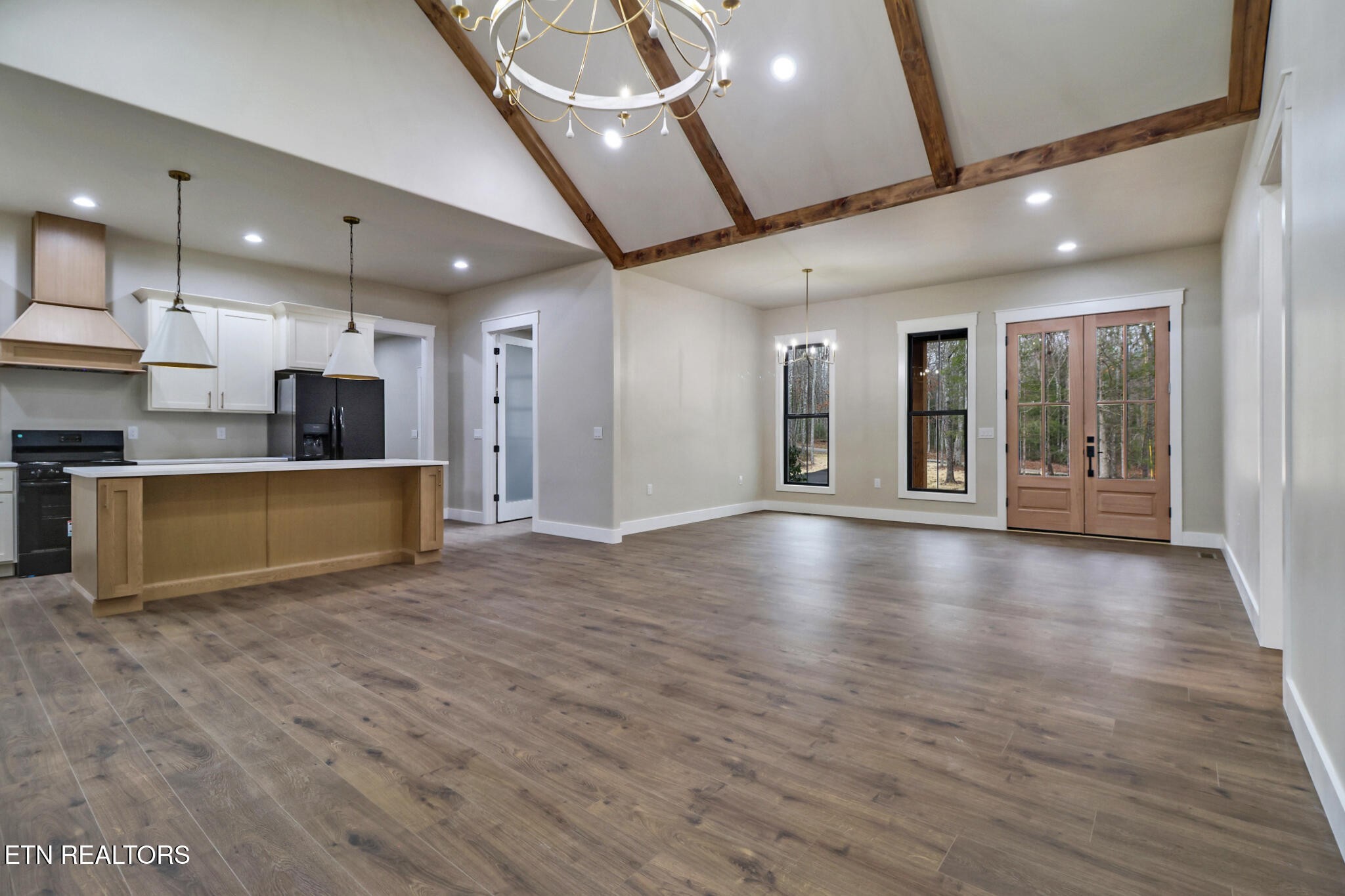 1440 Model Farm Road Jamestown, TN 38556 - Photo 12 of 35 a view of a kitchen with a sink and a large window