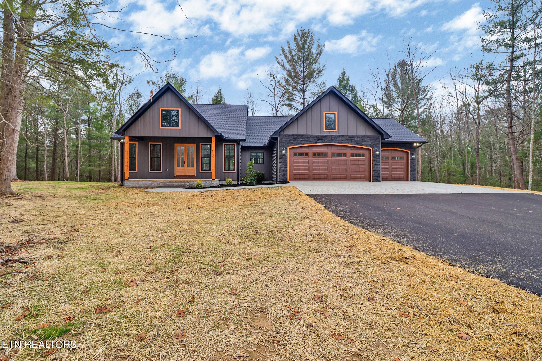 1440 Model Farm Road Jamestown, TN 38556 - Photo 3 of 35 a front view of a house with yard and trees