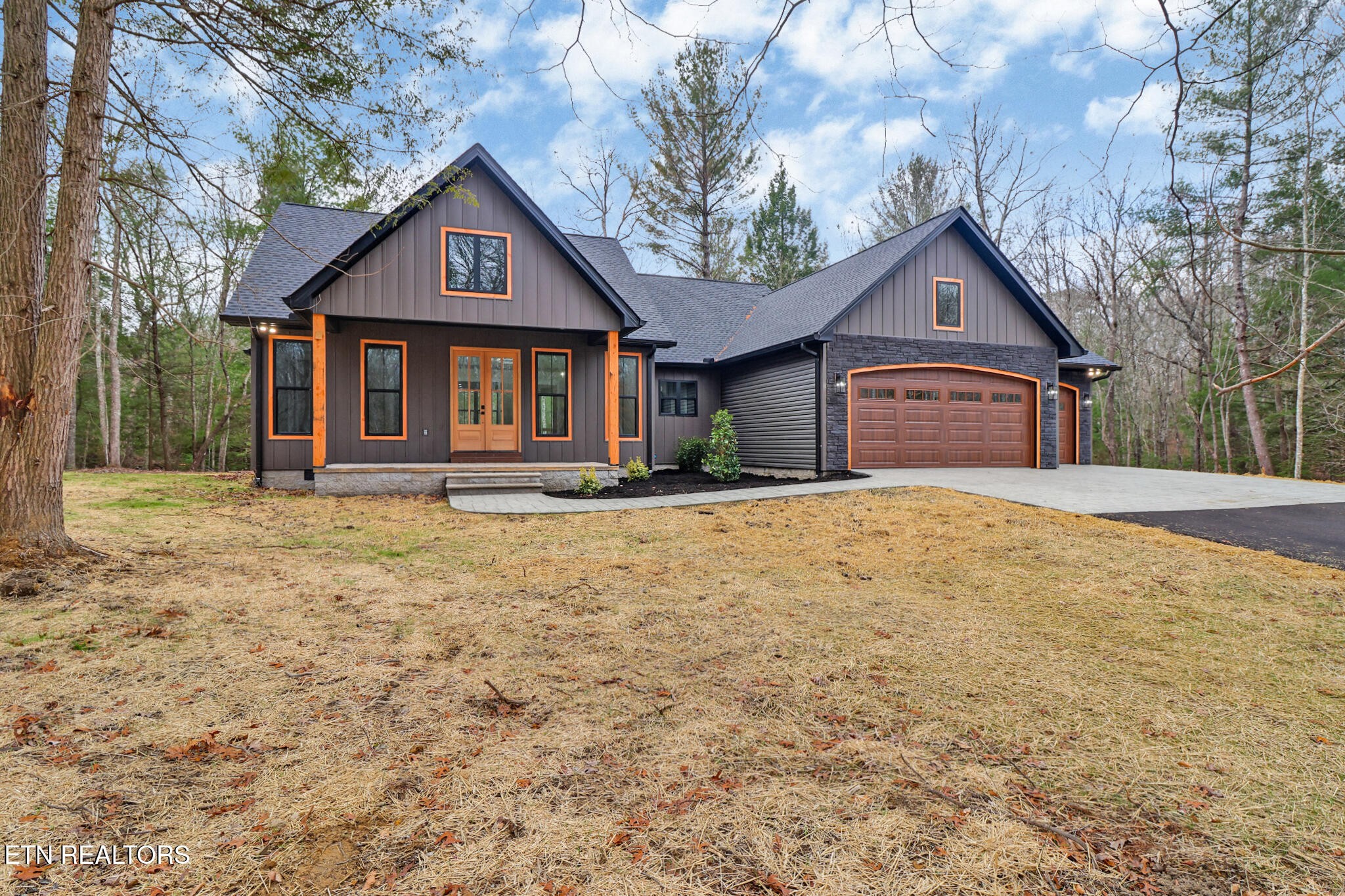1440 Model Farm Road Jamestown, TN 38556 - Photo 4 of 35 a front view of a house with a yard