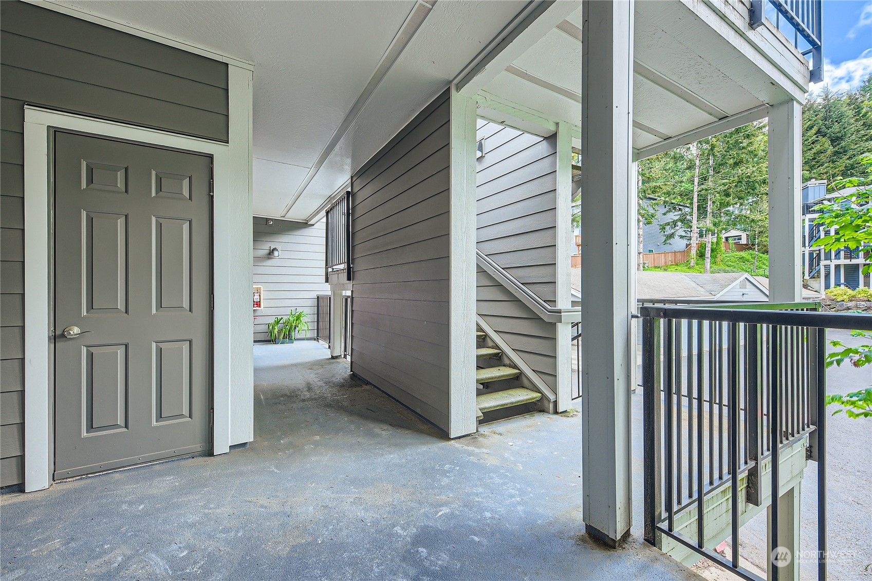 3901 243rd Place Southeast, Unit O203 Bothell, WA 98021 - Photo 11 of 11 a view of a house with porch