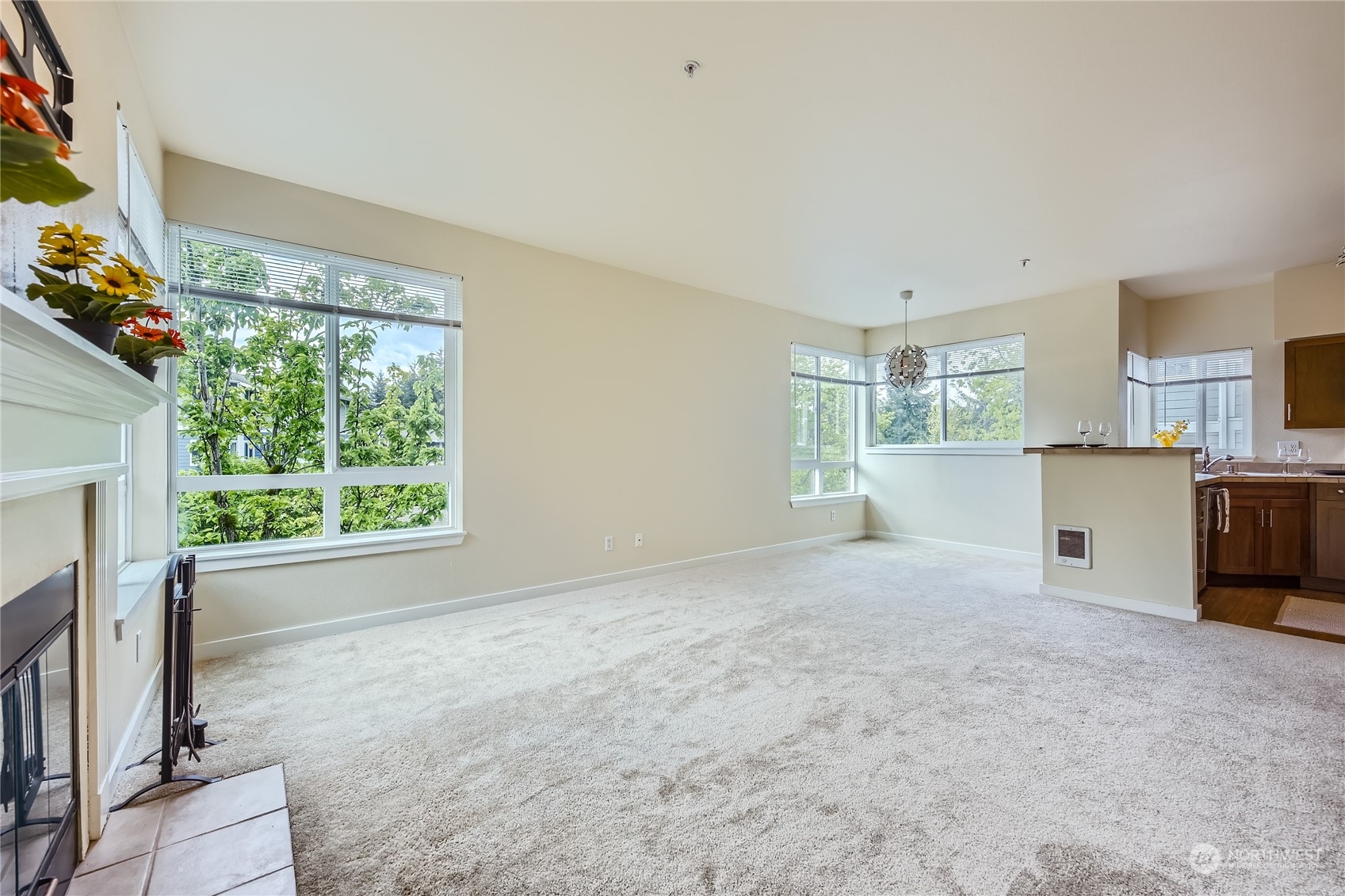 3901 243rd Place Southeast, Unit O203 Bothell, WA 98021 - Photo 4 of 11 a view of an empty room with a window