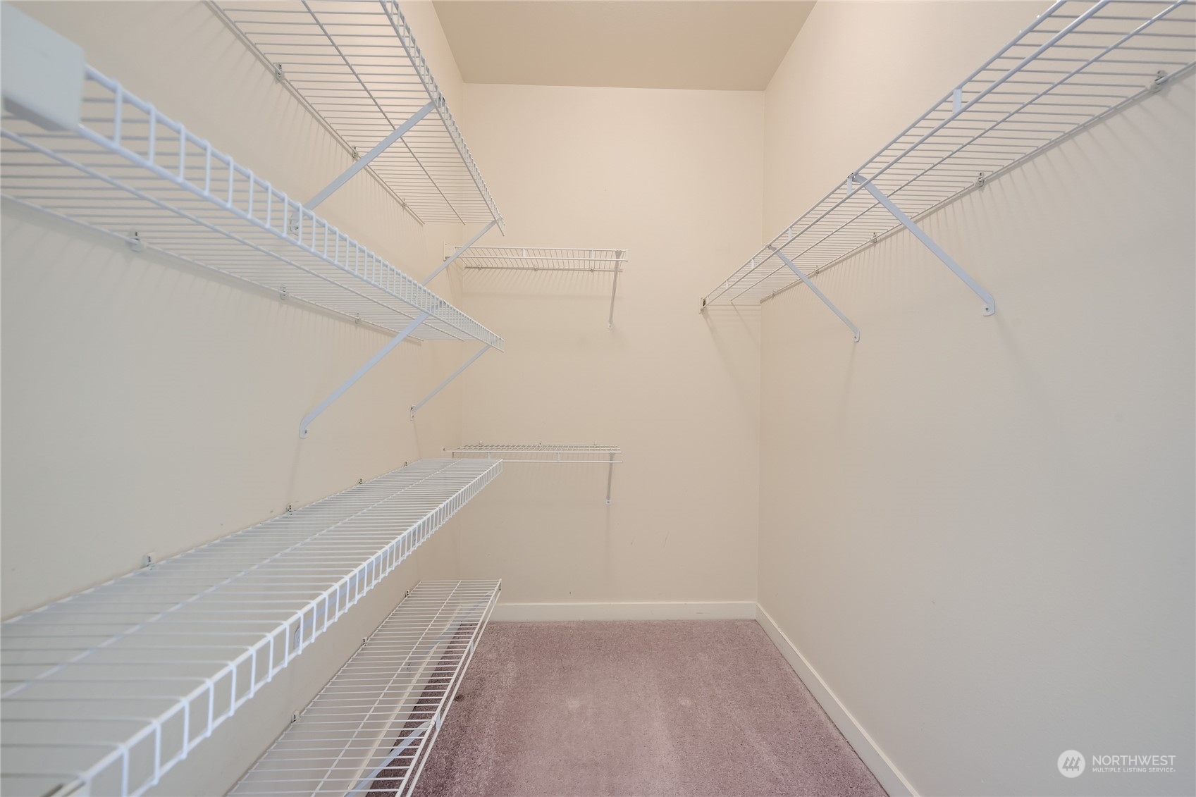 3901 243rd Place Southeast, Unit O203 Bothell, WA 98021 - Photo 9 of 11 a view of a room with racks on the wall