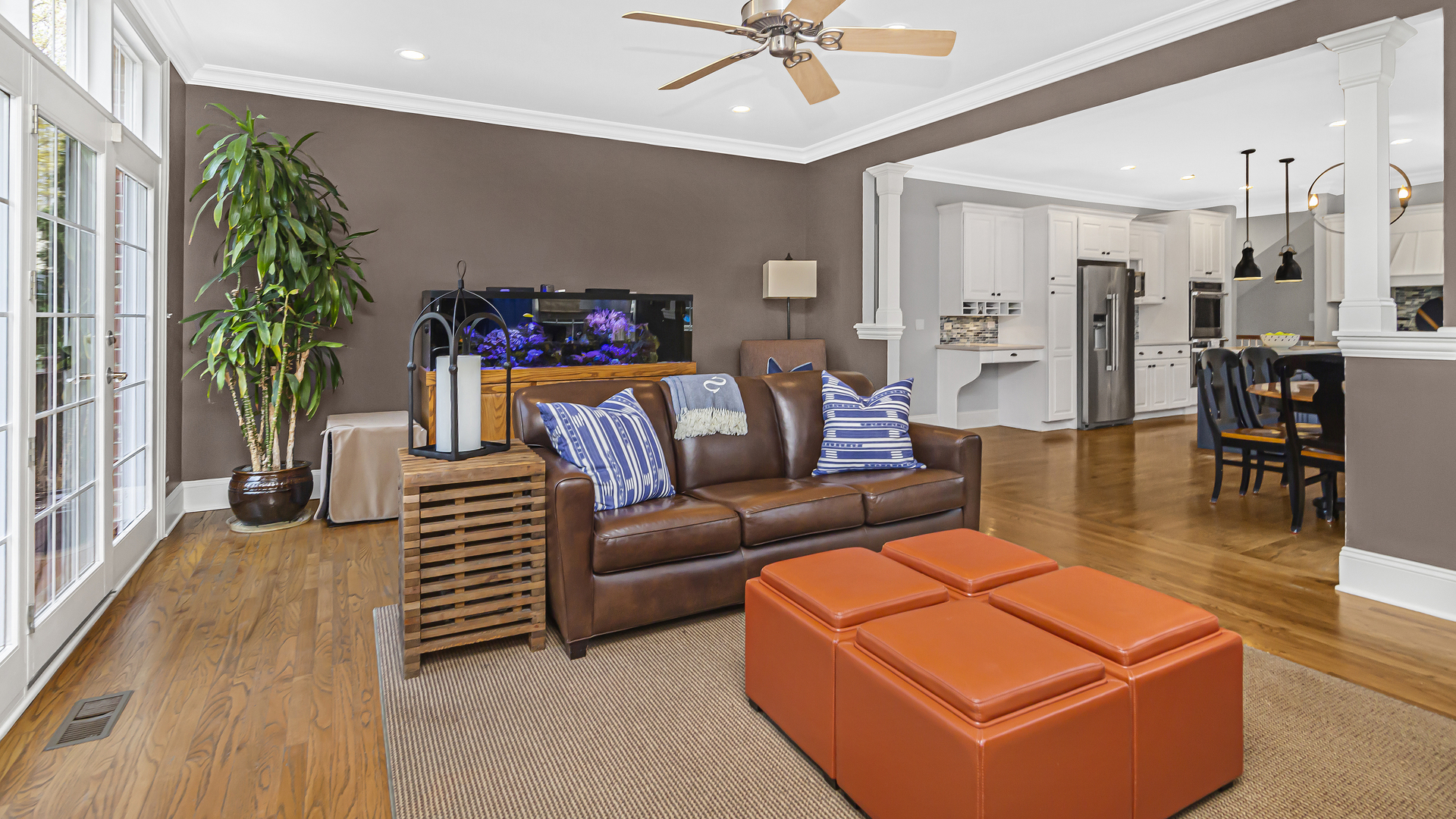 300 Walnut Street Winnetka, IL 60093 - Photo 11 of 28 a living room with furniture and a dining table with kitchen view