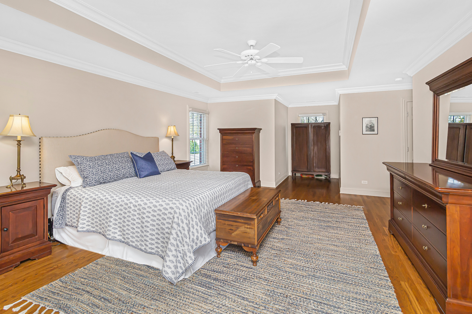 300 Walnut Street Winnetka, IL 60093 - Photo 18 of 28 a bedroom with a bed and wooden floor