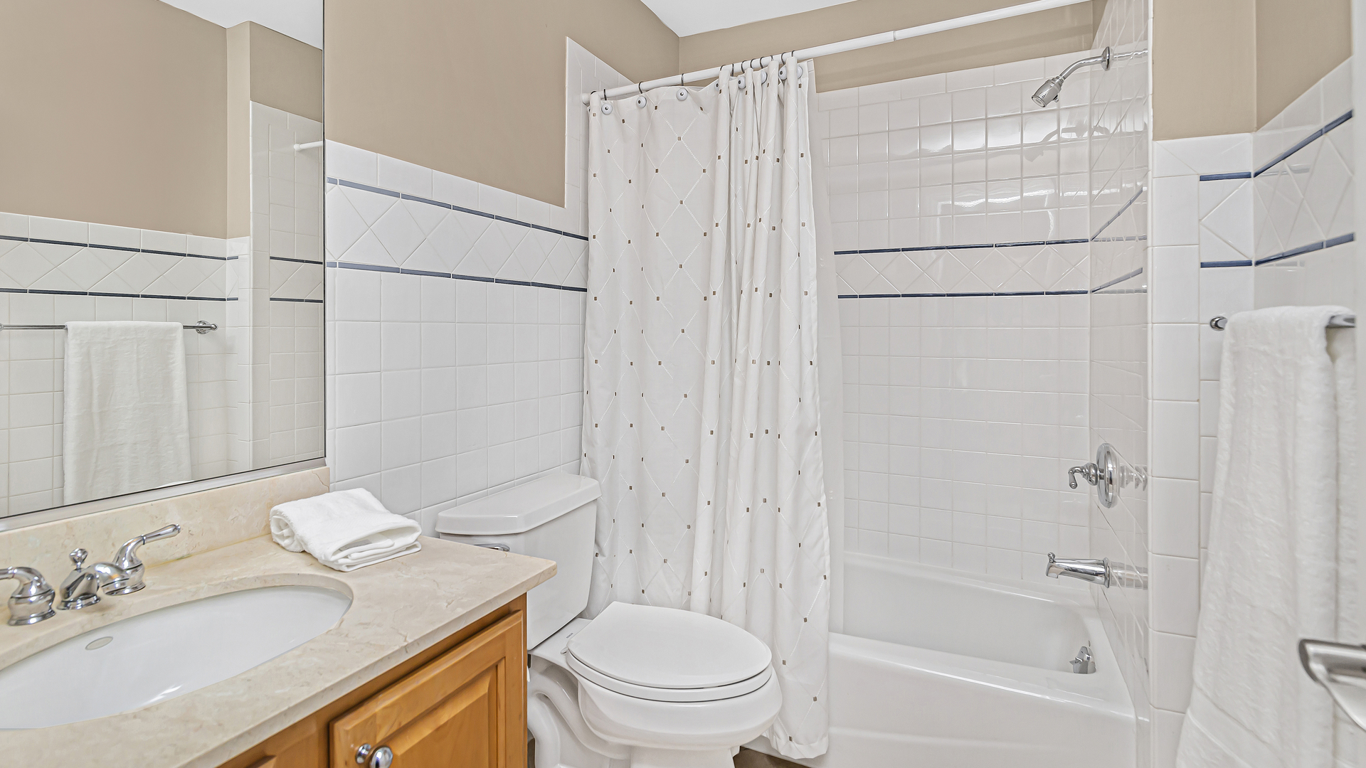 300 Walnut Street Winnetka, IL 60093 - Photo 22 of 28 a bathroom with a granite countertop sink toilet and shower