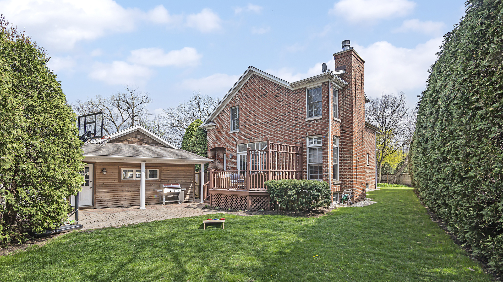 300 Walnut Street Winnetka, IL 60093 - Photo 25 of 28 a front view of a house with a yard