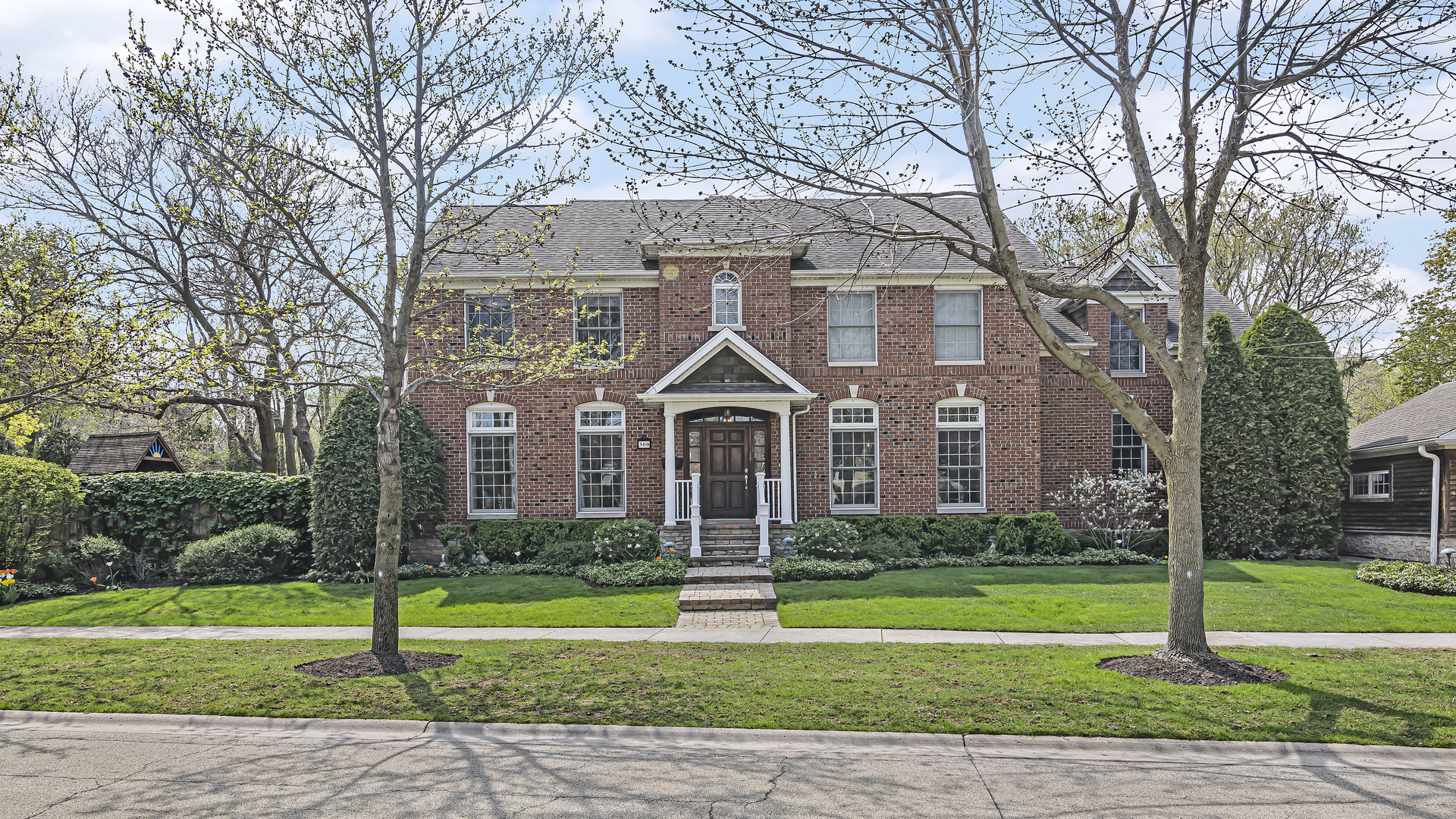 300 Walnut Street Winnetka, IL 60093 - Photo 27 of 28 a front view of a house with a yard