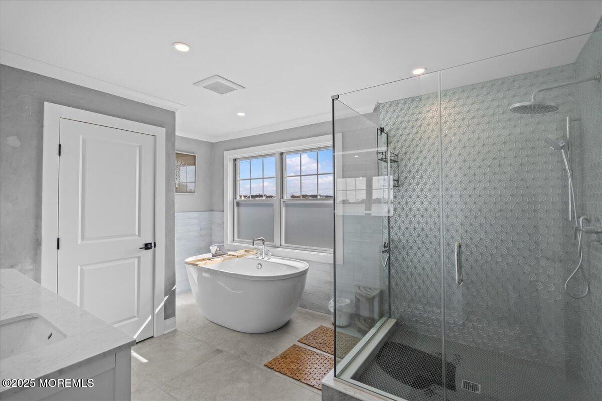 1608 East Street Point Pleasant Beach, NJ 08742 - Photo 14 of 51 a bathroom with a toilet a sink and shower