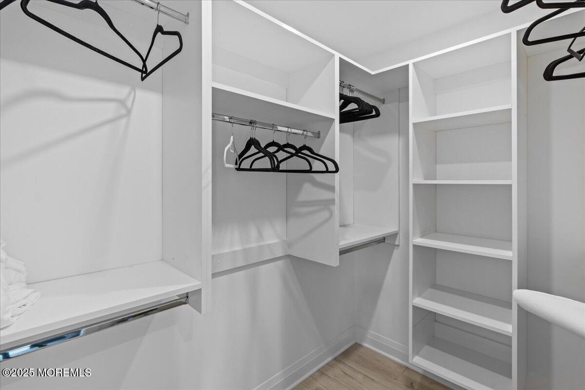 1608 East Street Point Pleasant Beach, NJ 08742 - Photo 15 of 51 a view of walk in closet with empty racks