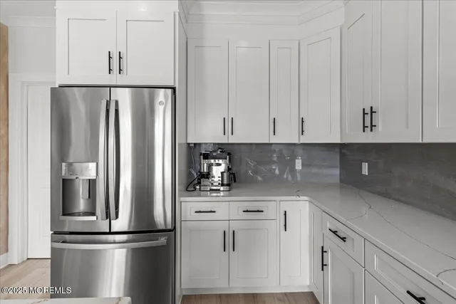 a view of kitchen with sink living room and living room view