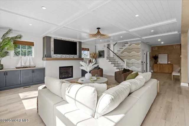a kitchen with kitchen island a dining table and appliances