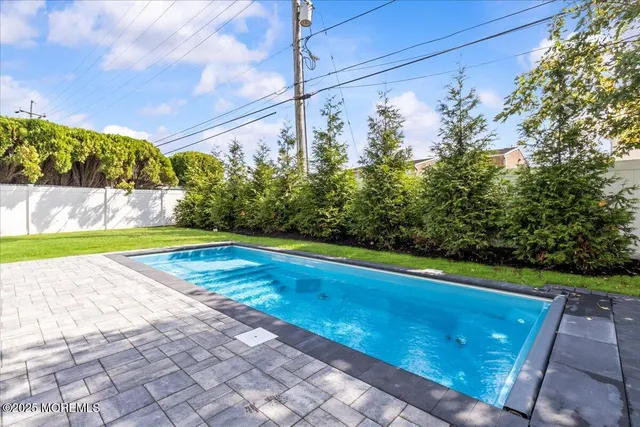 a view of a yard with an outdoor space
