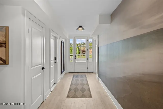 a view of a hallway with a natural light