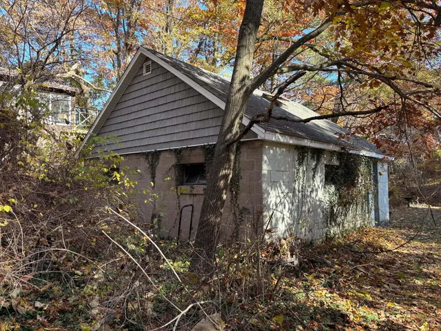 a backyard of a house with lots of green space