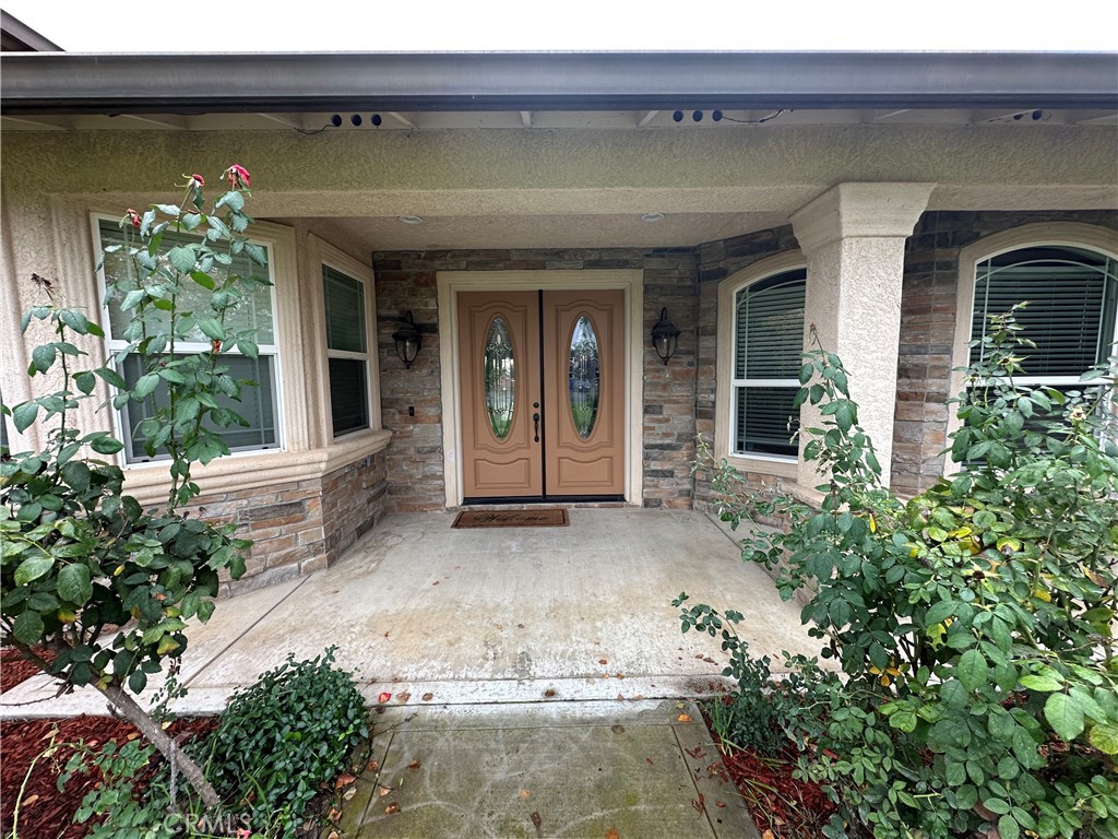3119 Lorrie Court Merced, CA 95348 - Photo 3 of 38 a view of a house with potted plants
