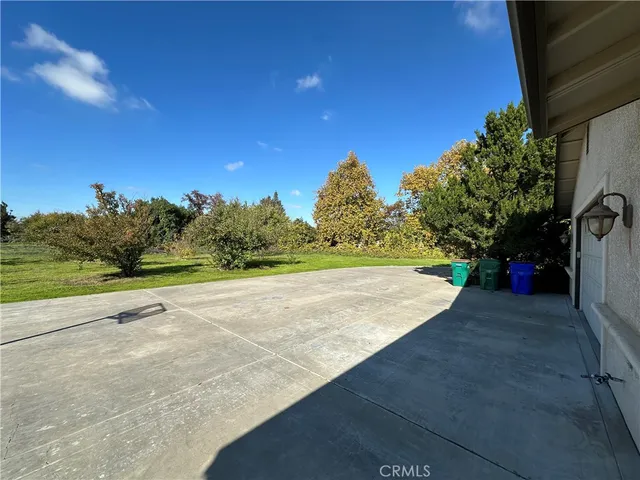 a view of a road with a yard