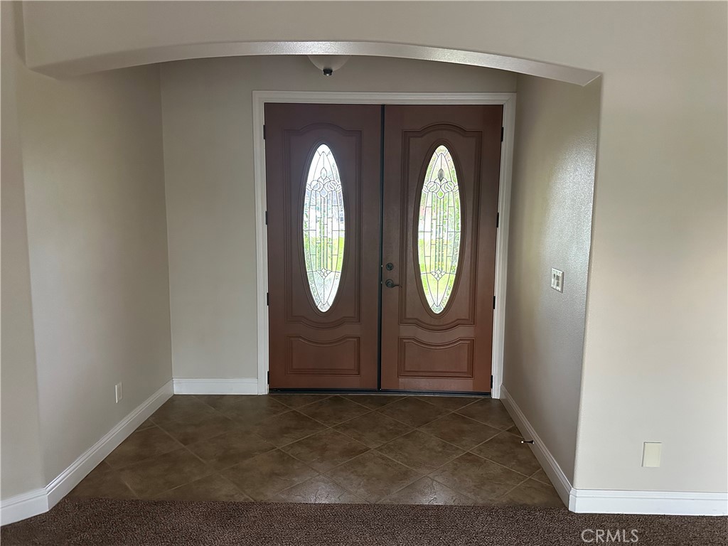 3119 Lorrie Court Merced, CA 95348 - Photo 7 of 38 a front view of a house with entryway