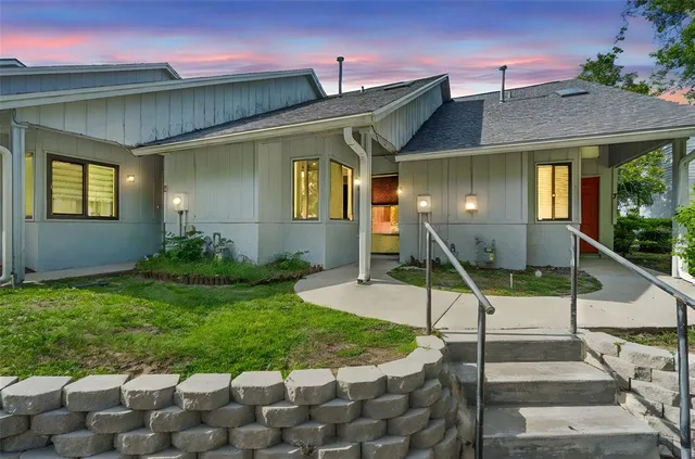 a house view with a garden space