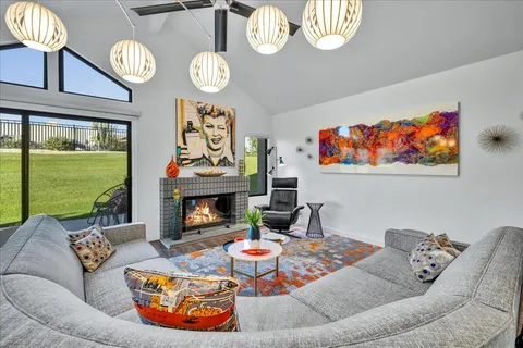 a large kitchen with a table and chairs in it