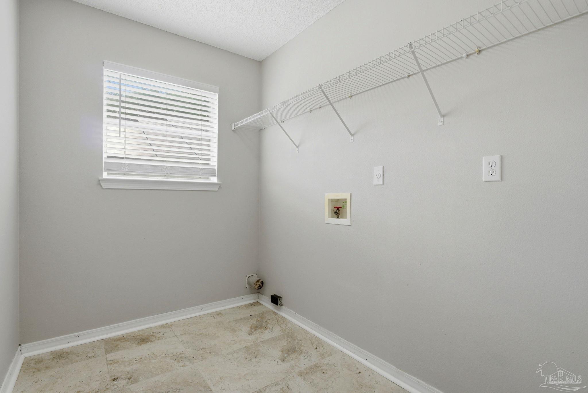 10120 Crest Ridge Drive Pensacola, FL 32514 - Photo 31 of 38 a view of a room that has a window in it