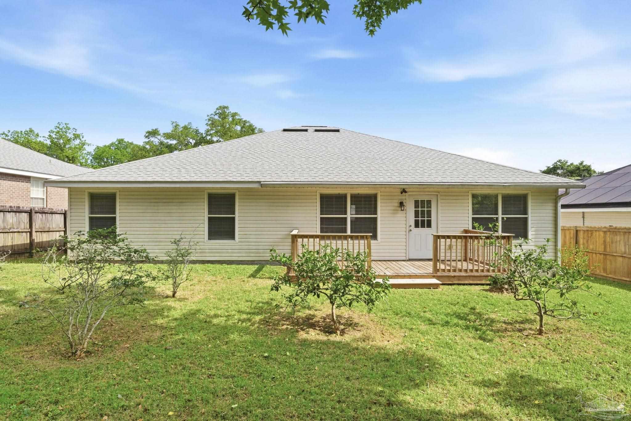 10120 Crest Ridge Drive Pensacola, FL 32514 - Photo 37 of 38 front view of house with a yard