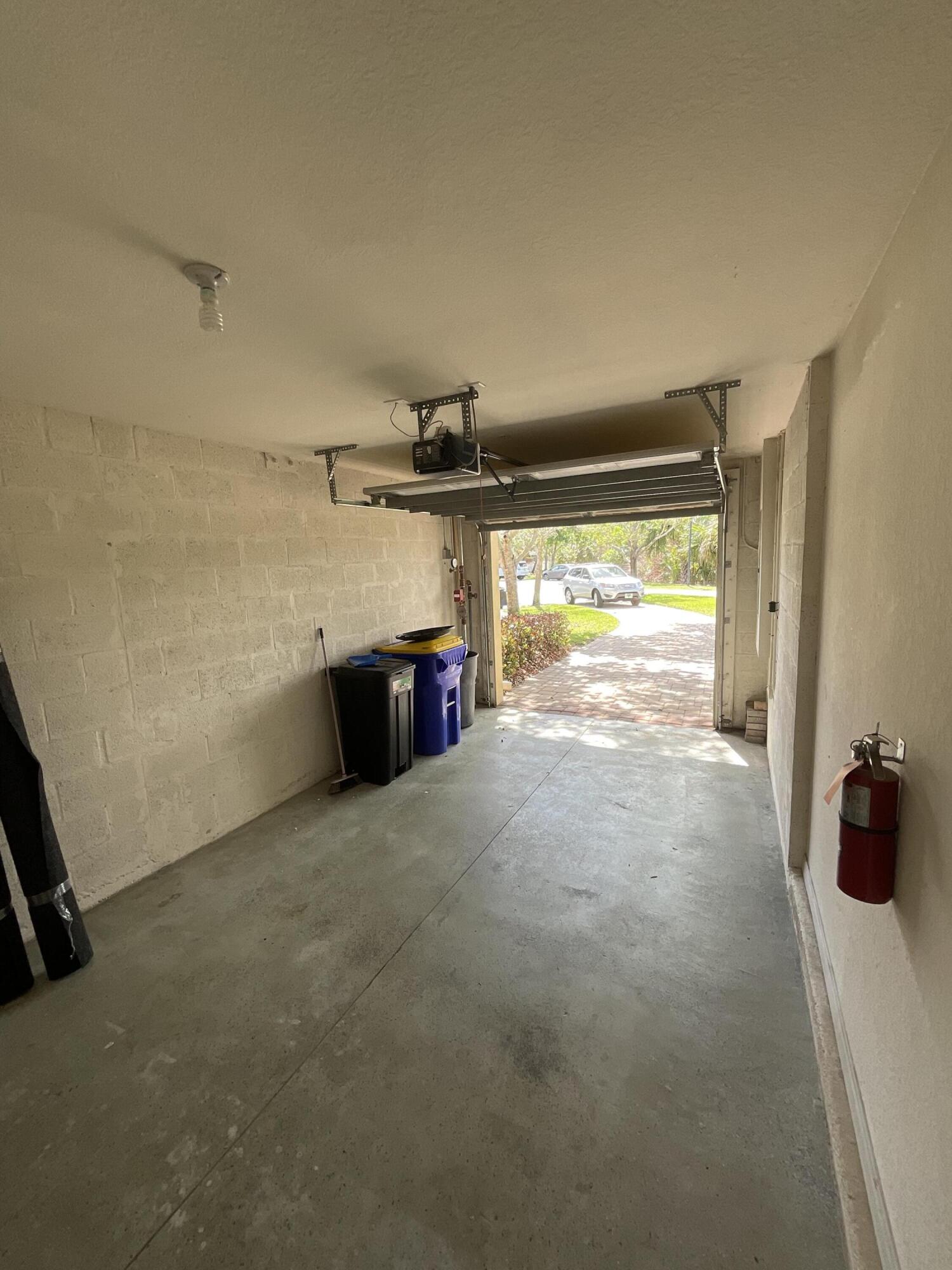 5269 Southeast Jennings Lane Stuart, FL 34997 - Photo 30 of 34 a view of a room with storage and utility