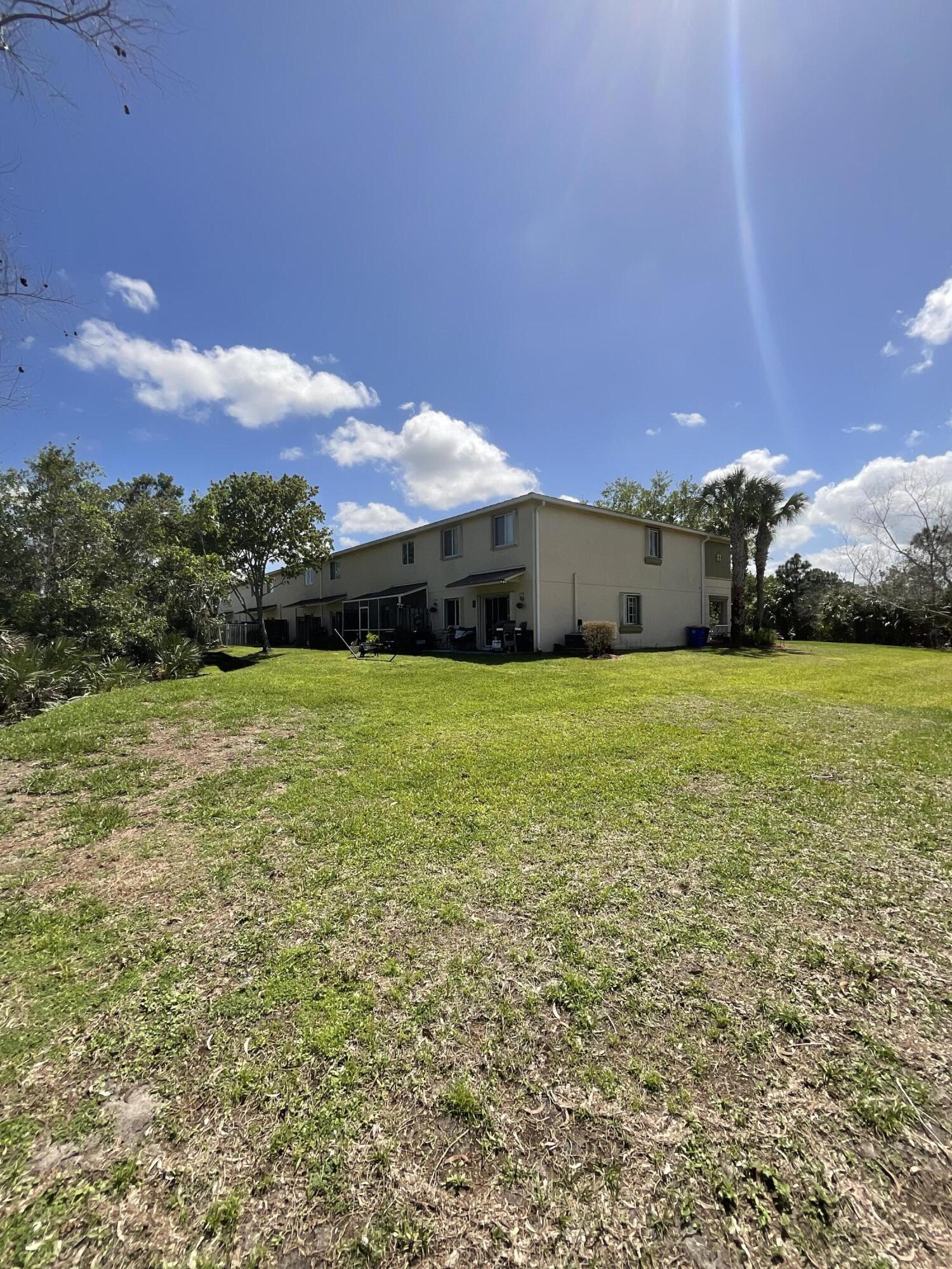 5269 Southeast Jennings Lane Stuart, FL 34997 - Photo 31 of 34 a view of a garden with an outdoor space