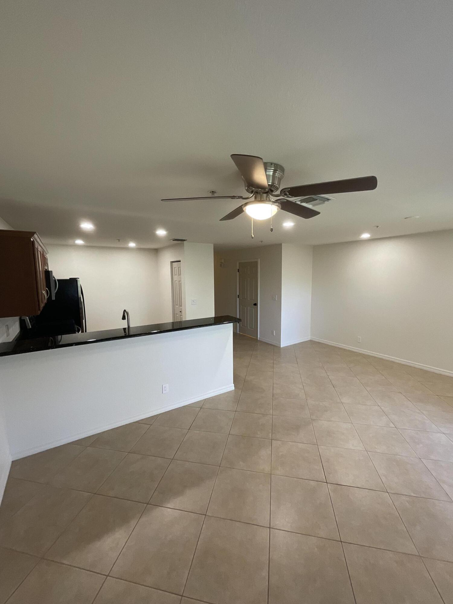 5269 Southeast Jennings Lane Stuart, FL 34997 - Photo 10 of 34 a view of an empty room