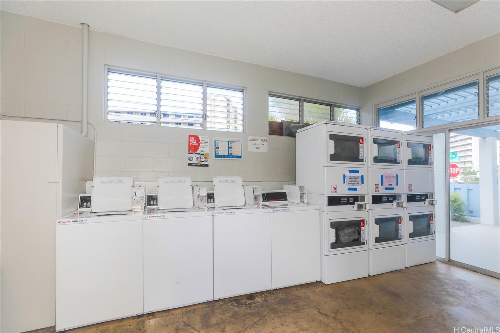 3095 Ala Ilima Street, Unit 204 Honolulu, HI 96818 - Photo 13 of 16 a kitchen with refrigerator and window