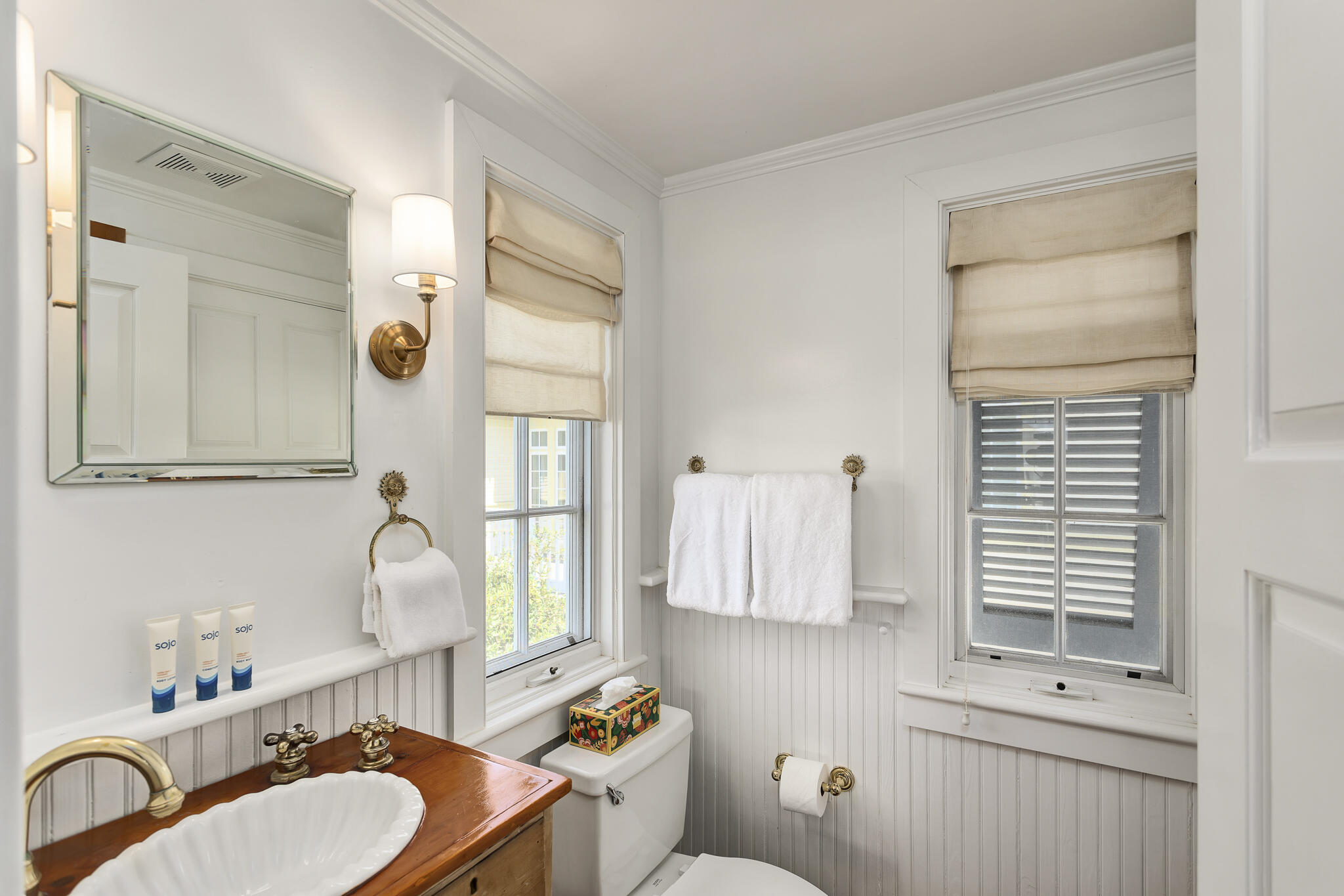 2040 East County Highway 30A Santa Rosa Beach, FL 32459 - Photo 38 of 51 a bathroom with a sink vanity granite and toilet