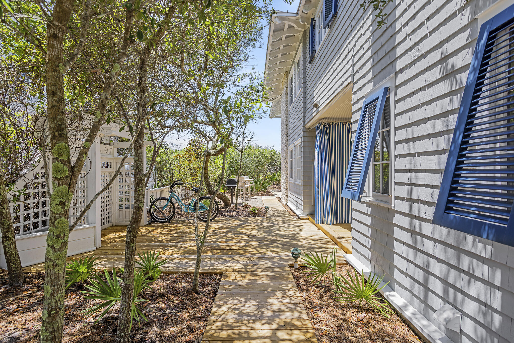 2040 East County Highway 30A Santa Rosa Beach, FL 32459 - Photo 10 of 51 a view of a house with a yard