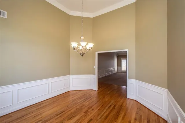 a view of livingroom with hardwood floor and hallway