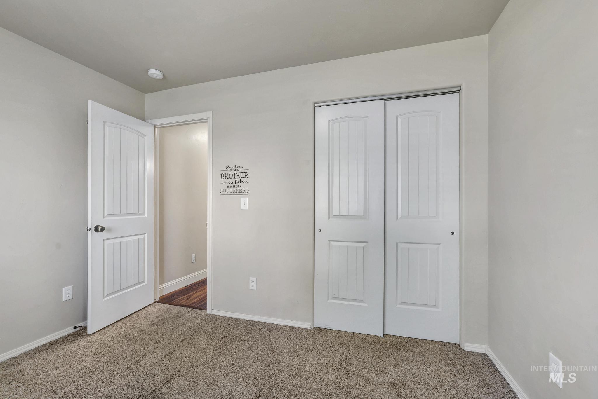 446 Noble Street Twin Falls, ID 83301 - Photo 17 of 42 Neutral-toned room featuring a soft carpeted floor and light grey walls