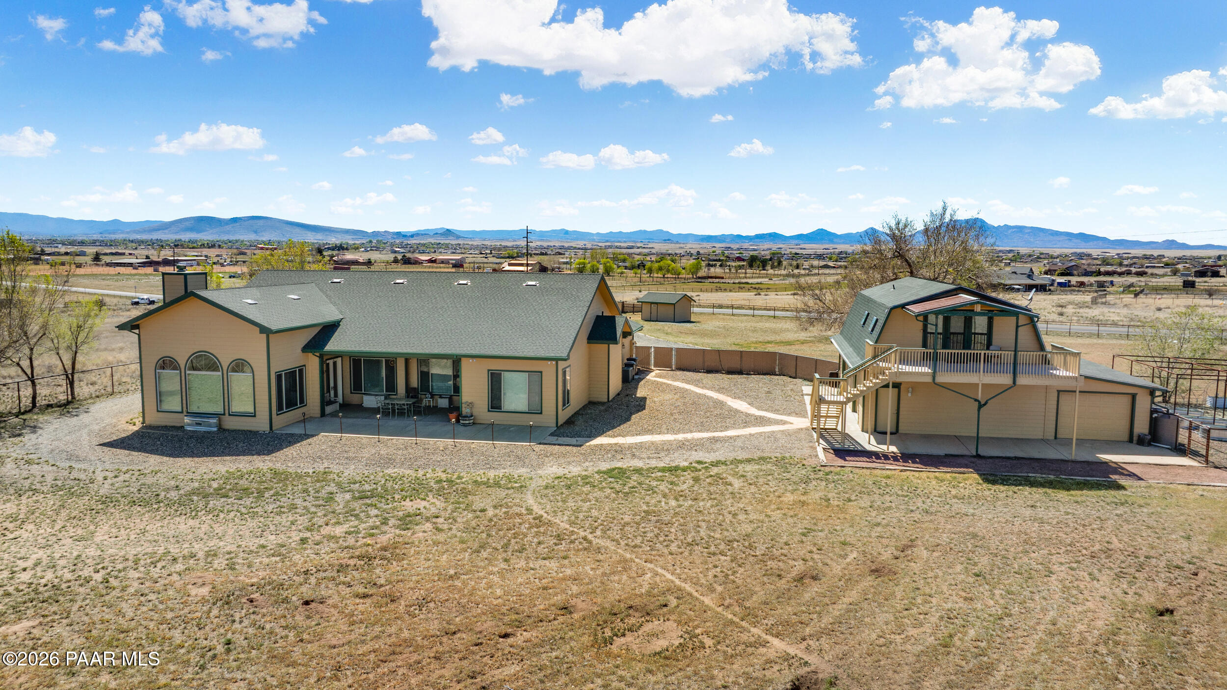 9605 North Coyote Springs Road Prescott Valley, AZ 86315 - Photo 20 of 43 a view of a house with a lake view