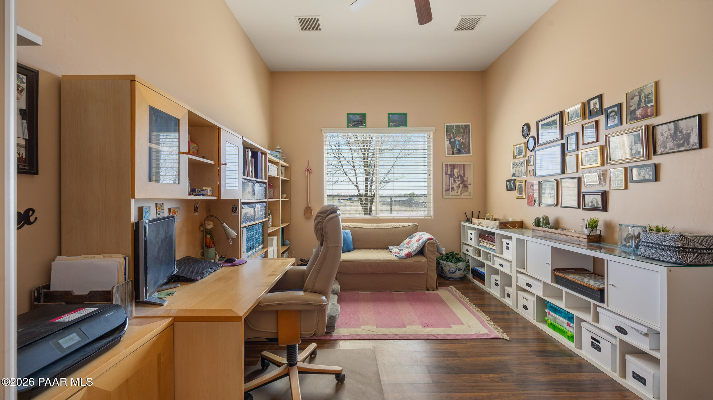 9605 North Coyote Springs Road Prescott Valley, AZ 86315 - Photo 22 of 43 a living room with furniture and a couch